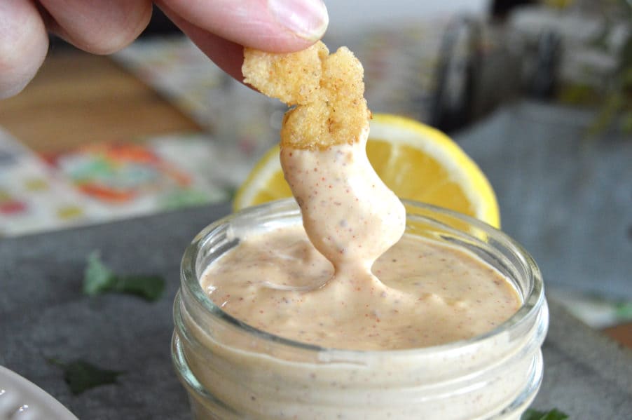 Perfectly crispy, gluten free golden fried calamari with dynamite dipping sauce