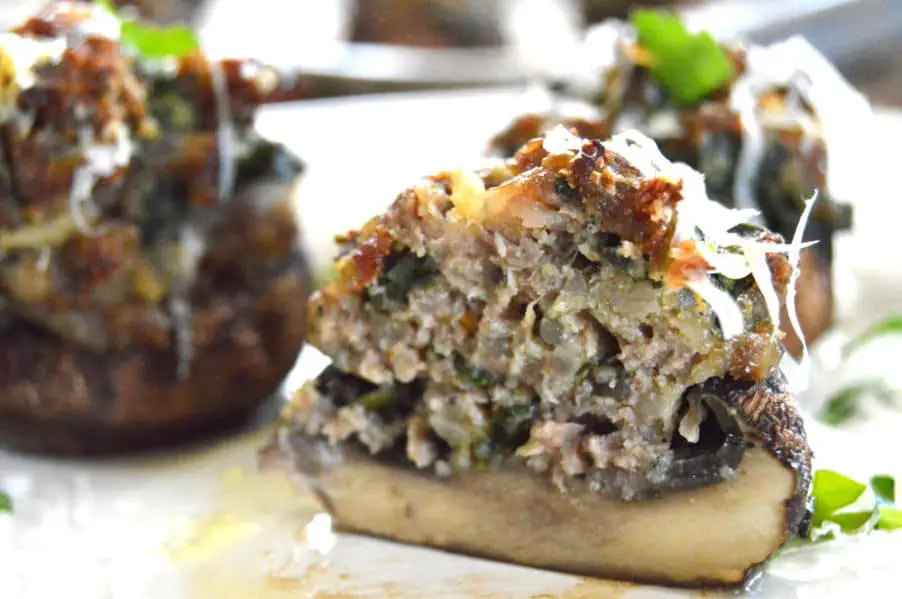 Sausage & Spinach Stuffed Mushrooms...savory, spicy, yummy goodness.