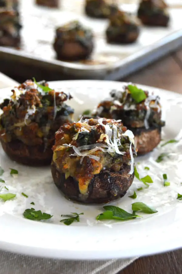 Sausage & Spinach Stuffed Mushrooms...savory, spicy, yummy goodness.