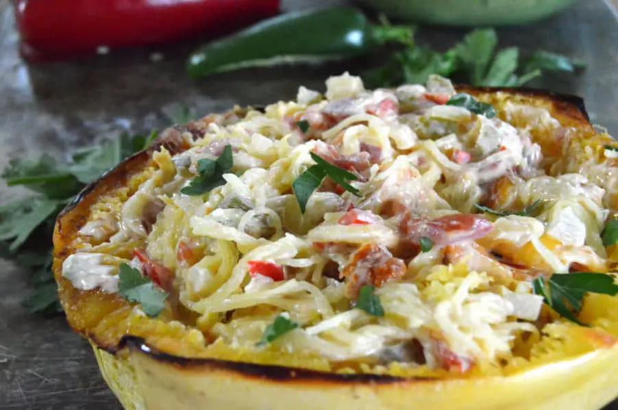South of the Border Spaghetti squash is loaded with veggies and a creamy, cheesy sauce. Low carb, gluten free