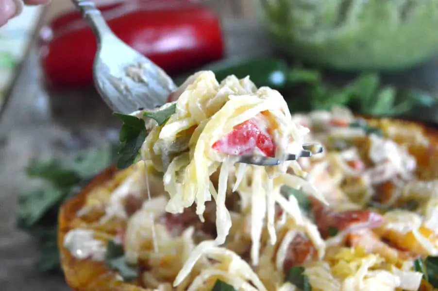 South of the Border Spaghetti squash is loaded with veggies and a creamy, cheesy sauce. Low carb, gluten free