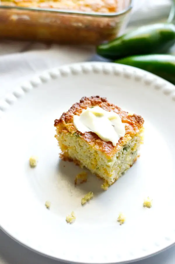 Piece of Low Carb Jalapeno Cheddar Cornbread with Butter