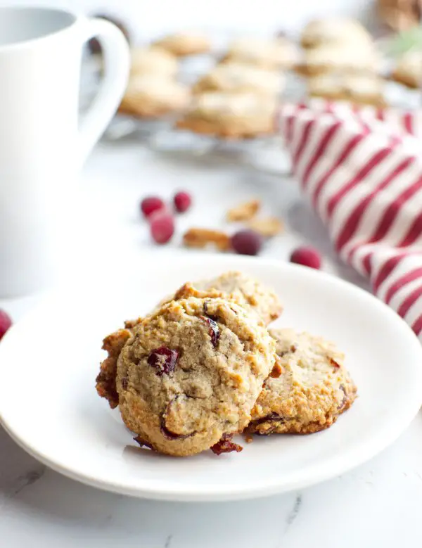 keto cookie with cranberry walnuts and coconut on a plate